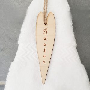 Gäster, hängande skylt hjärta